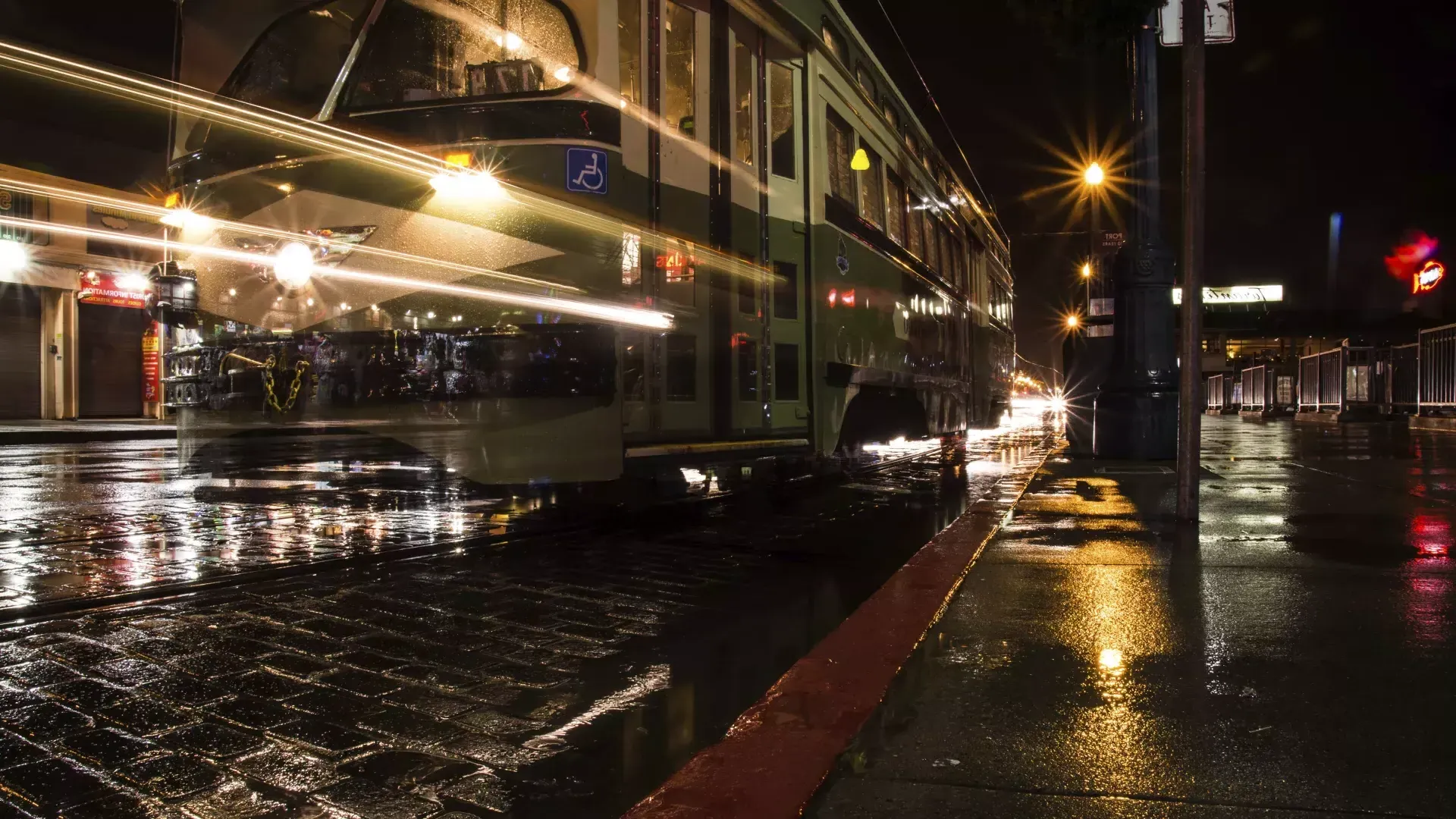 Streetcar at night in the rain